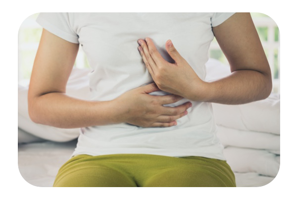 Woman burning chest suffering acid reflux